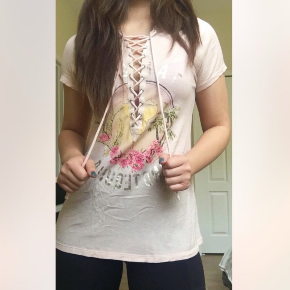 distressed peach colored graphic tee